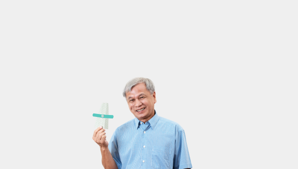 Elderly individual holding u series